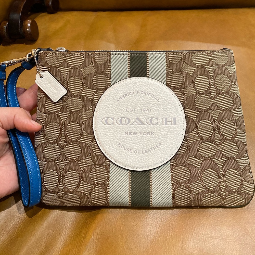 Large Coach wristlet.